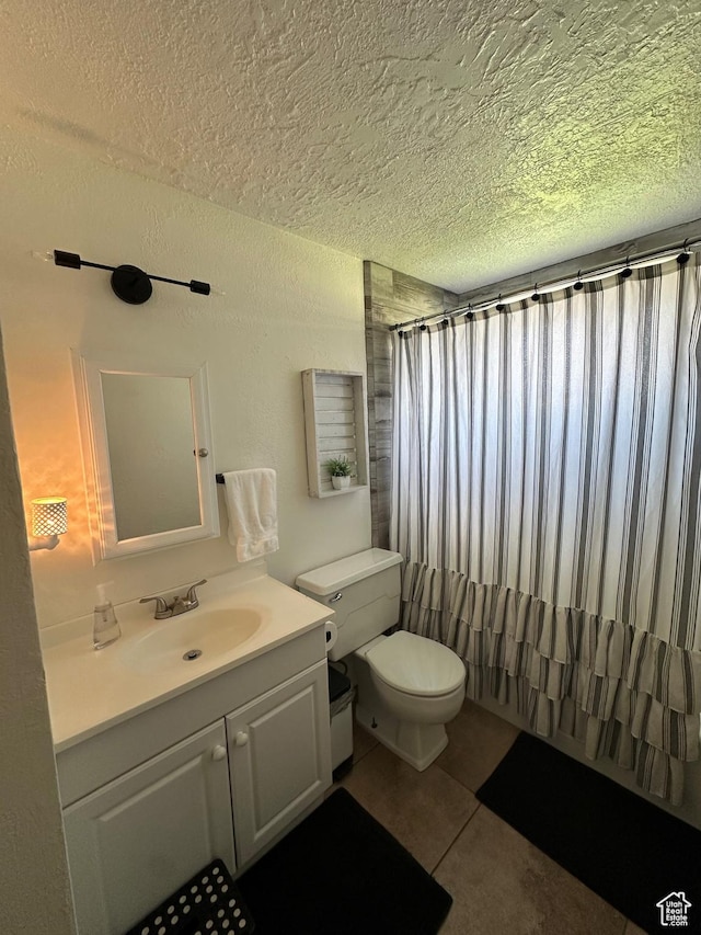2714 E 1000 N, Ballard, UT 84066 - bathroom with a textured ceiling, vanity, curtained shower, and tile patterned flooring