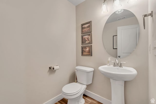 940 N Center St, Santaquin, UT 84655 - half bath with toilet and wood finished floors