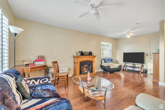 382 N Peach St, Santaquin, UT 84655 - living area featuring a ceiling fan, wood finished floors, and a glass covered fireplace