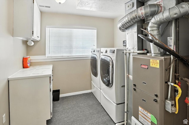 416 N 450 W, Clearfield, UT 84015 - washroom featuring washing machine and dryer, cabinet space, carpet floors, and heating unit