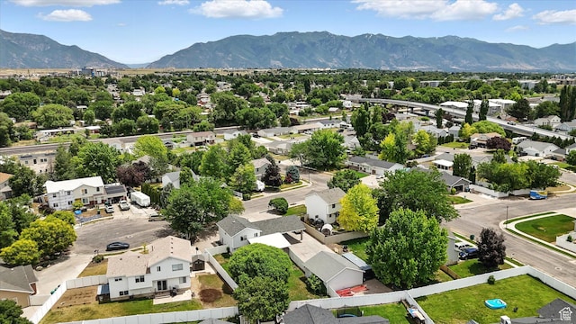 416 N 450 W, Clearfield, UT 84015 - aerial view of residential area with a mountainous background