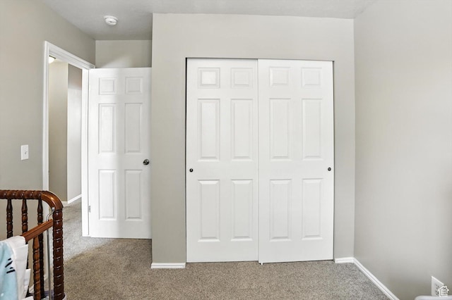 416 N 450 W, Clearfield, UT 84015 - carpeted bedroom featuring a closet and baseboards