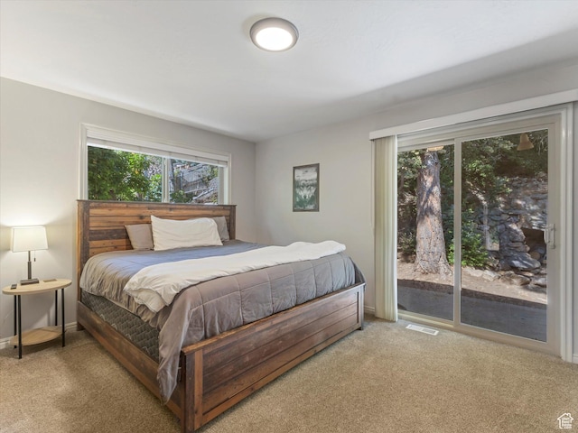 4783 S Bron Breck St, Salt Lake City, UT 84117 - bedroom featuring access to outside and light colored carpet