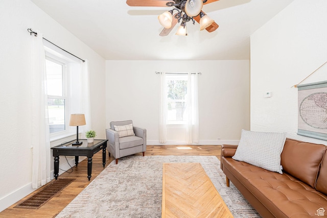 13 N 100 W, Smithfield, UT 84335 - sitting room featuring a ceiling fan and light wood finished floors