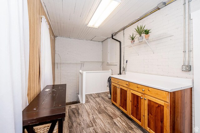 13 N 100 W, Smithfield, UT 84335 - laundry room featuring brick wall and wood finished floors