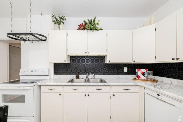 13 N 100 W, Smithfield, UT 84335 - kitchen with white appliances, light countertops, tasteful backsplash, and white cabinetry