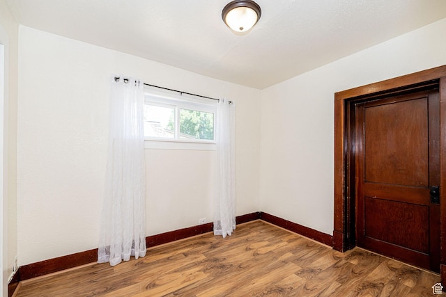 13 N 100 W, Smithfield, UT 84335 - unfurnished room featuring baseboards and light wood-style floors