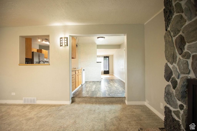 19 S Dale Ave, Vernal, UT 84078 - corridor with carpet and a textured ceiling