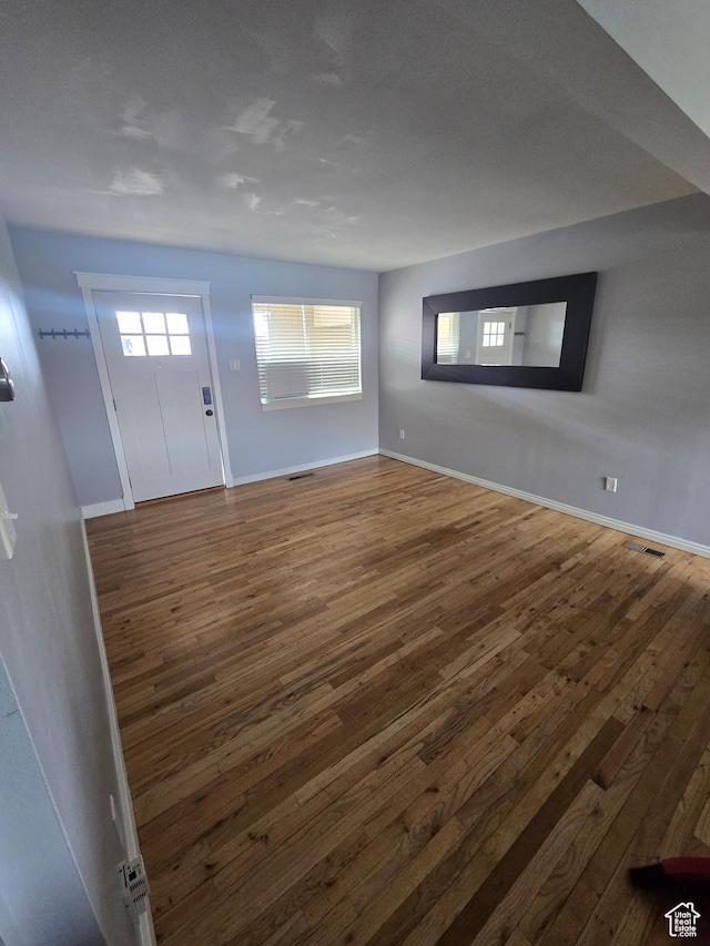 650 N 300 W Unit 206, Salt Lake City, UT 84103 - entrance foyer featuring dark wood finished floors and baseboards