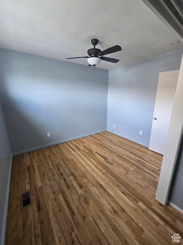 650 N 300 W Unit 206, Salt Lake City, UT 84103 - empty room with ceiling fan and wood finished floors