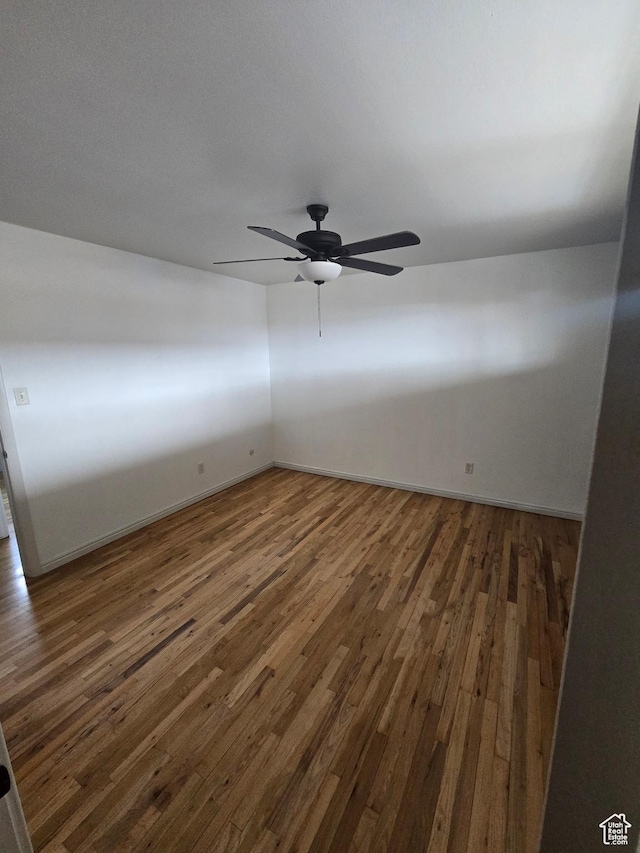 650 N 300 W Unit 206, Salt Lake City, UT 84103 - spare room featuring wood finished floors and a ceiling fan