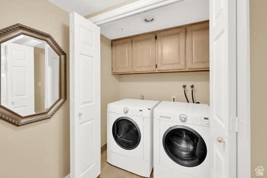 426 S 1000 E Unit 707, Salt Lake City, UT 84102 - washroom featuring cabinet space and washing machine and dryer