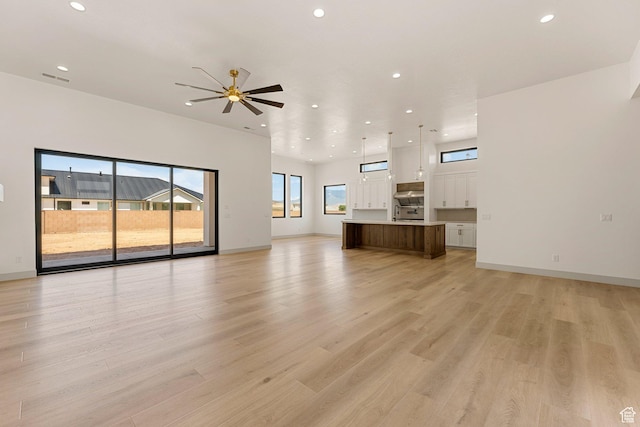 1762 S 920 W, Hurricane, UT 84737 - unfurnished living room featuring recessed lighting, a ceiling fan, and light wood finished floors