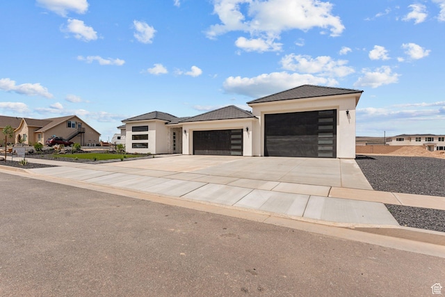 1762 S 920 W, Hurricane, UT 84737 - view of front of home featuring stucco siding, a garage, concrete driveway, a residential view, and a tile roof
