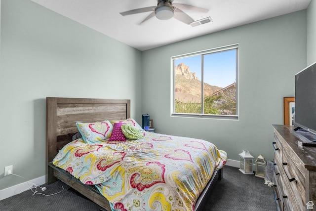 130 Matilda Ln, Springdale, UT 84767 - bedroom featuring dark carpet and a ceiling fan