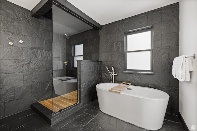 51 Daly Ave, Park City, UT 84060 - full bathroom with a walk in shower, healthy amount of natural light, a freestanding bath, tile walls, and marble finish flooring