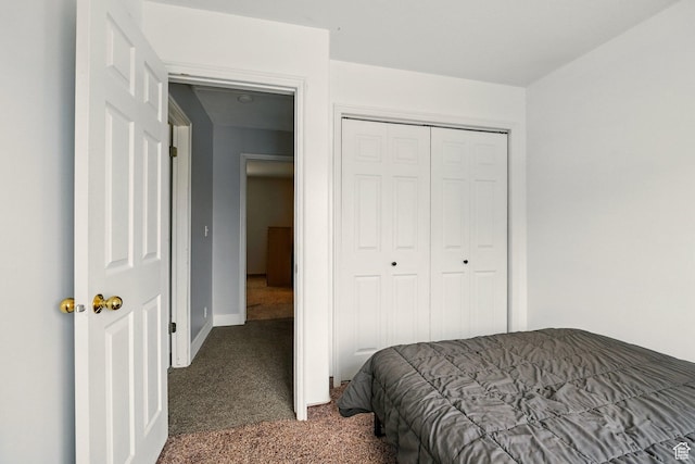 1260 S Riverview Dr, Garland, UT 84312 - bedroom with carpet flooring and a closet