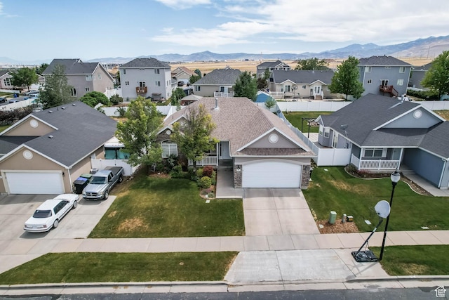 6743 W Spring Oak Dr, West Jordan, UT 84081 - aerial view of residential area featuring a mountain backdrop