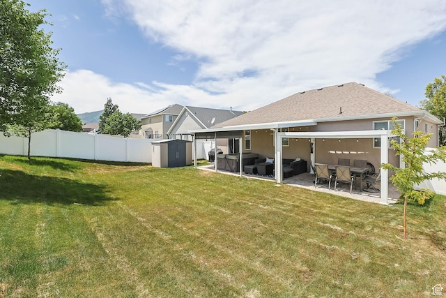 6743 W Spring Oak Dr, West Jordan, UT 84081 - back of property with outdoor lounge area, a storage shed, a patio area, a fenced backyard, and stucco siding