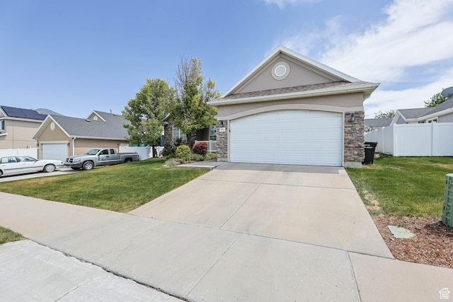 6743 W Spring Oak Dr, West Jordan, UT 84081 - view of front of home with stone siding, concrete driveway, a garage, and stucco siding