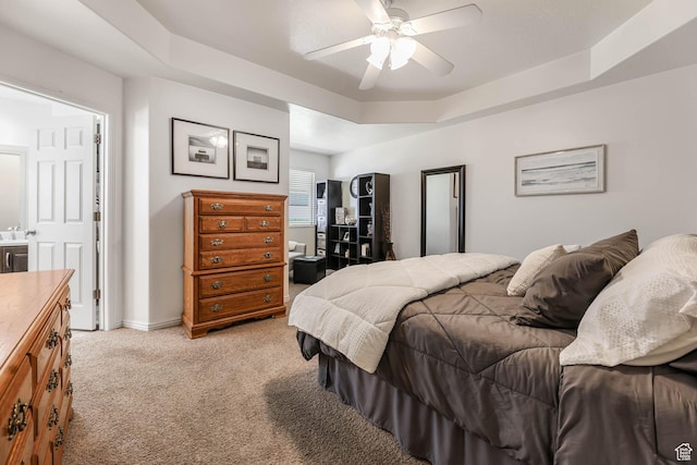 6743 W Spring Oak Dr, West Jordan, UT 84081 - bedroom with light colored carpet, a tray ceiling, and ceiling fan