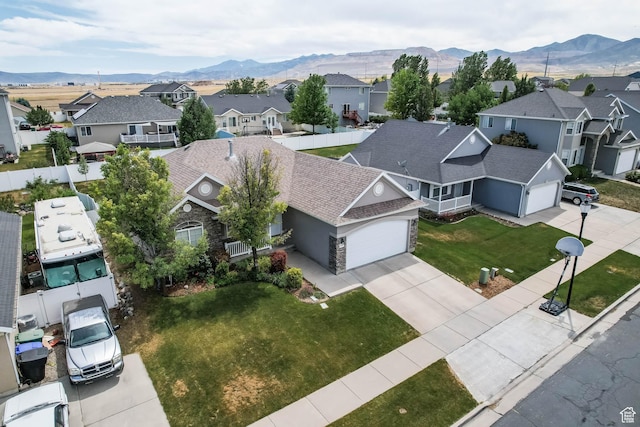 6743 W Spring Oak Dr, West Jordan, UT 84081 - aerial perspective of suburban area featuring mountains