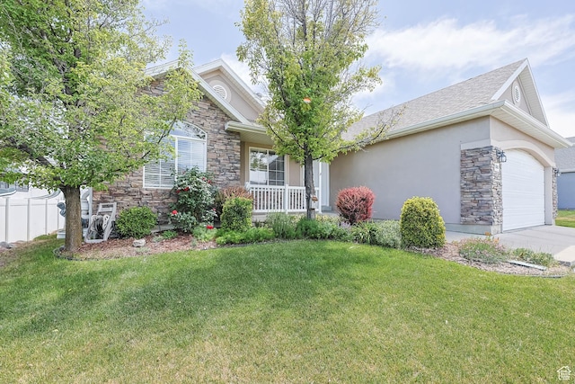 6743 W Spring Oak Dr, West Jordan, UT 84081 - view of front of property featuring stone siding, a front lawn, a garage, and a porch