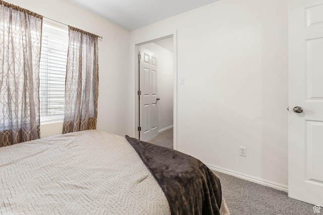 6743 W Spring Oak Dr, West Jordan, UT 84081 - carpeted bedroom featuring baseboards