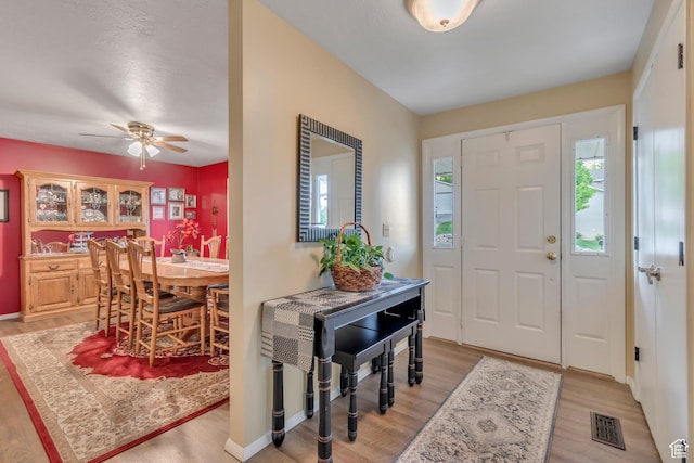 955 W Charlotte Dr, South Jordan, UT 84095 - entrance foyer with light wood-style floors and ceiling fan