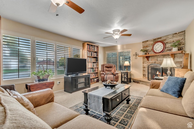 955 W Charlotte Dr, South Jordan, UT 84095 - living room featuring a ceiling fan, carpet floors, and a fireplace