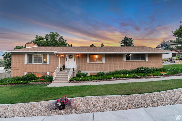 955 W Charlotte Dr, South Jordan, UT 84095 - ranch-style home featuring a yard, brick siding, and a chimney