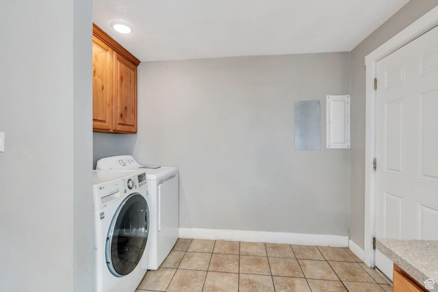 145 S 500 W, Orem, UT 84058 - washroom with cabinet space, washing machine and dryer, and light tile patterned flooring