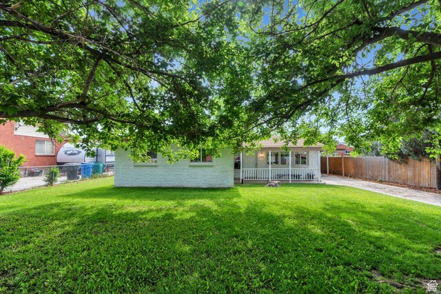 145 S 500 W, Orem, UT 84058 - back of property featuring brick siding and covered porch