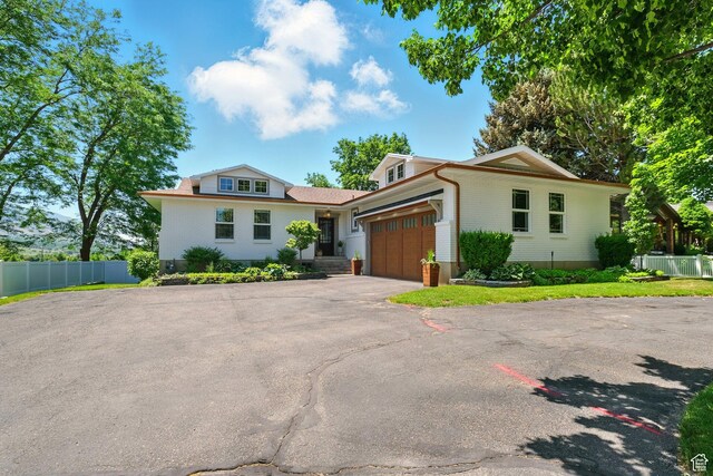 964 E Stewart Hill Dr, River Heights, UT 84321 - view of front facade with an attached garage and driveway