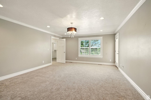 964 E Stewart Hill Dr, River Heights, UT 84321 - empty room with crown molding, a chandelier, a textured ceiling, recessed lighting, and light carpet