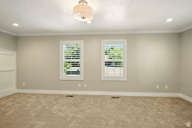 964 E Stewart Hill Dr, River Heights, UT 84321 - empty room featuring carpet flooring, ornamental molding, recessed lighting, and a textured ceiling