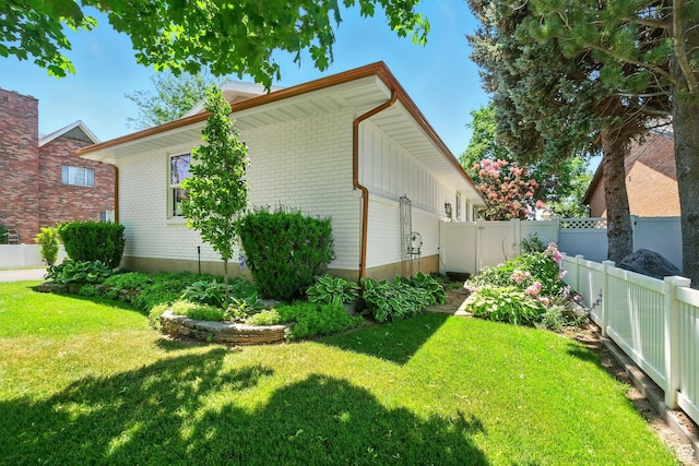 964 E Stewart Hill Dr, River Heights, UT 84321 - view of property exterior featuring a fenced backyard and brick siding