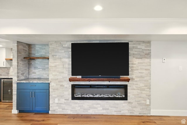 964 E Stewart Hill Dr, River Heights, UT 84321 - detailed view of crown molding, beverage cooler, wood finished floors, and recessed lighting