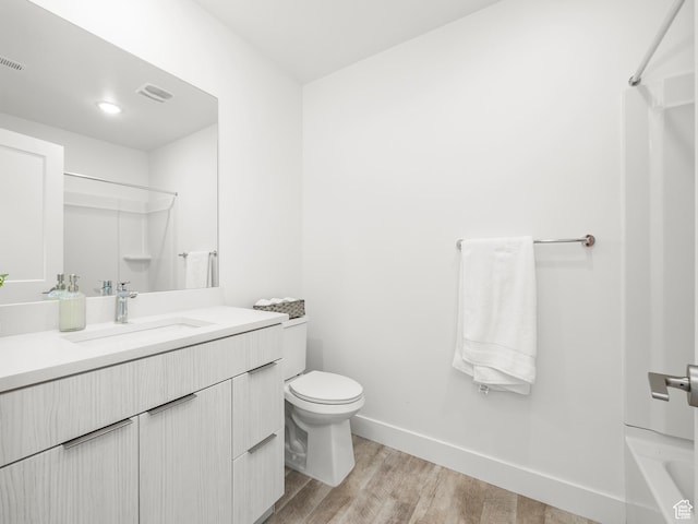 6191 W S Jordan Pkwy S Unit 286, South Jordan, UT 84009 - bathroom featuring vanity, wood finished floors, and bathtub / shower combination