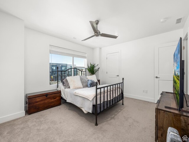 6191 W S Jordan Pkwy S Unit 286, South Jordan, UT 84009 - bedroom with light colored carpet and ceiling fan