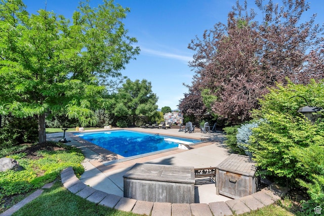 9967 N 6670 W, Highland, UT 84003 - outdoor pool with a diving board, a patio, and view of scattered trees