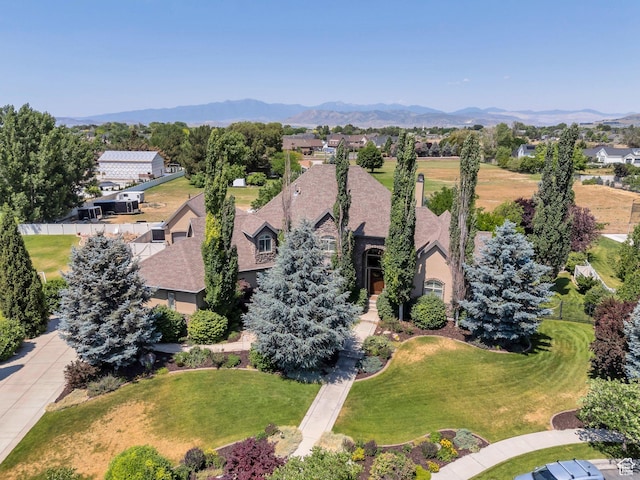 9967 N 6670 W, Highland, UT 84003 - aerial perspective of suburban area with a mountainous background