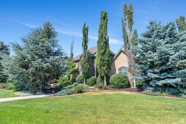 9967 N 6670 W, Highland, UT 84003 - view of front of home with a front yard