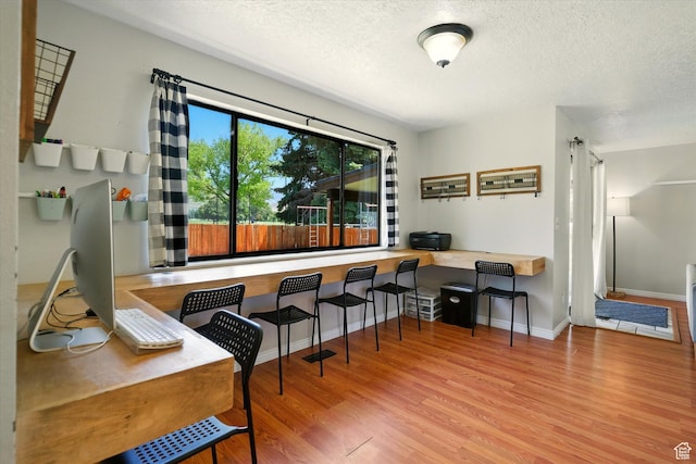 130 Summit Dr, Smithfield, UT 84335 - office space with wood finished floors and a textured ceiling
