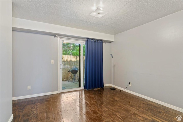 1423 S 1175 E Unit 1, Ogden, UT 84404 - spare room with a textured ceiling and wood finished floors
