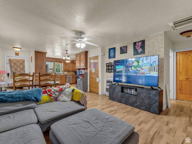 6126 S Middlewood Cir W, Salt Lake City, UT 84118 - living area with light wood finished floors, a ceiling fan, and a textured ceiling