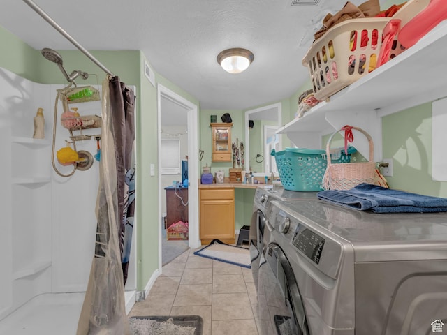 6126 S Middlewood Cir W, Salt Lake City, UT 84118 - laundry room featuring washer and clothes dryer and light tile patterned flooring
