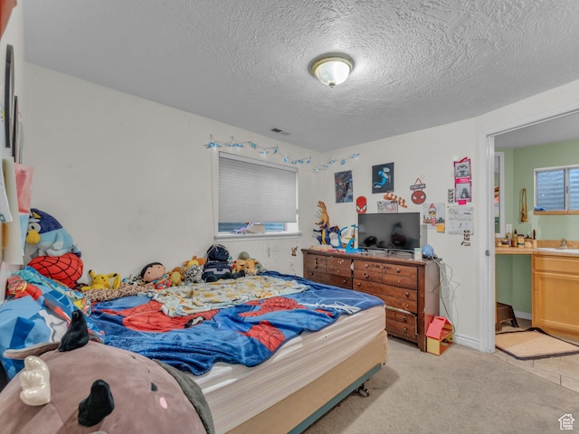 6126 S Middlewood Cir W, Salt Lake City, UT 84118 - bedroom with a textured ceiling and light carpet