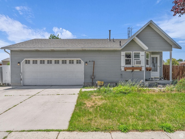 6126 S Middlewood Cir W, Salt Lake City, UT 84118 - view of front of home with driveway, an attached garage, and roof with shingles
