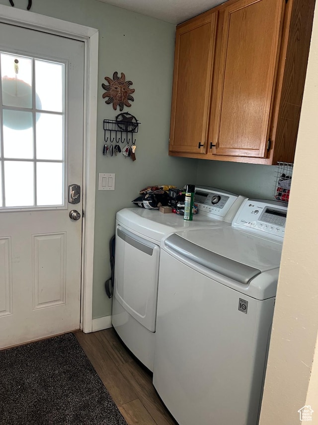 696 S 100 E, Roosevelt, UT 84066 - laundry room featuring separate washer and dryer, cabinet space, and wood finished floors